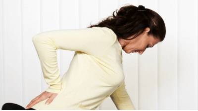 Болит спина слева в районе поясницы у женщин