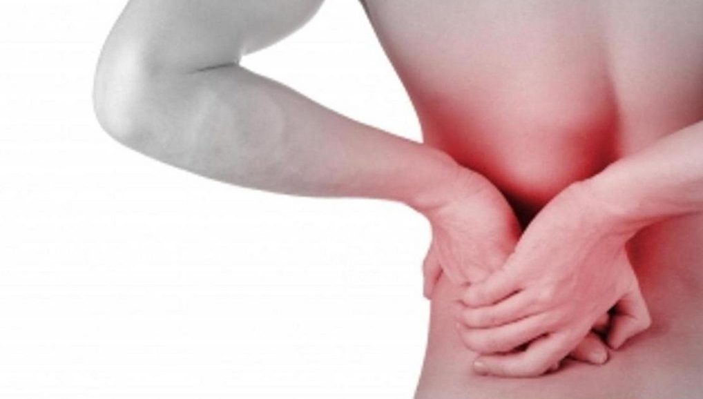 Боль в спине перед месячными