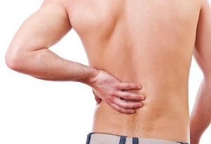 Болит низ спины с левой стороны что это